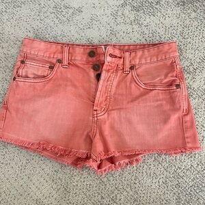 Free People! 5-button fly, coral-color jean shorts, raw edge. Size 27 mid-rise